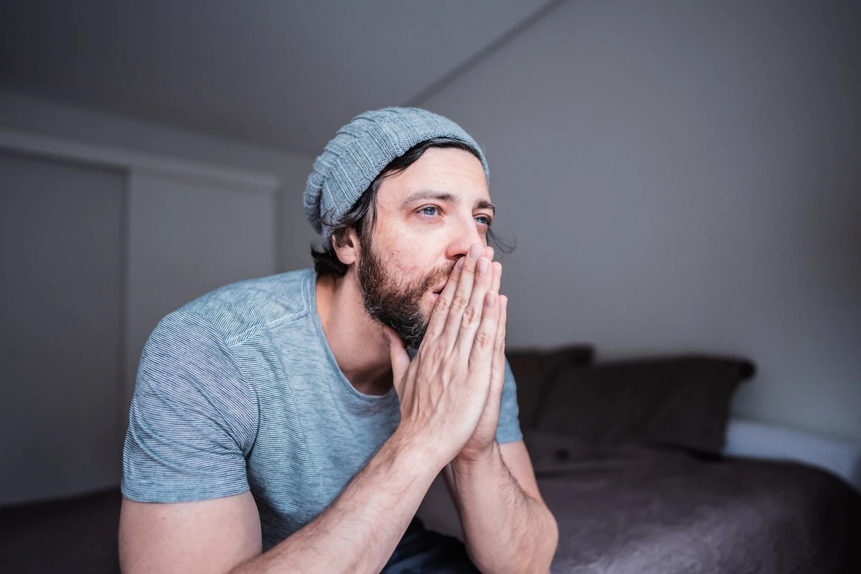 Woman looking up thoughtfully